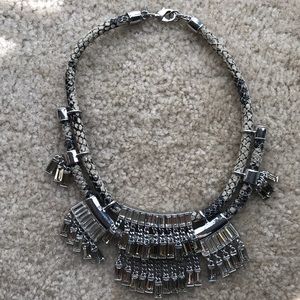Faux snakeskin necklace with silver and gem detail